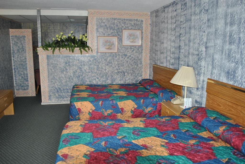 Travel Inn Motel Michigan Stadt Zimmer foto